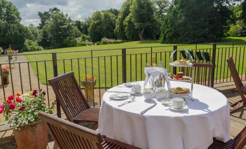 a table with a plate of food on a fence at Grinkle Park Hotel in Loftus
