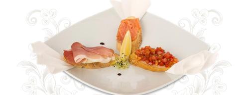a white plate with a sandwich with meat and sauce at Hotel Impero in Oradea