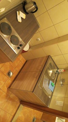 a bathroom with a sink and a toilet at Beachfront Apartments Oaza in Petrovac na Moru