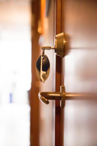 a close up of a door with a lock at Hotell Aston in Karlskrona