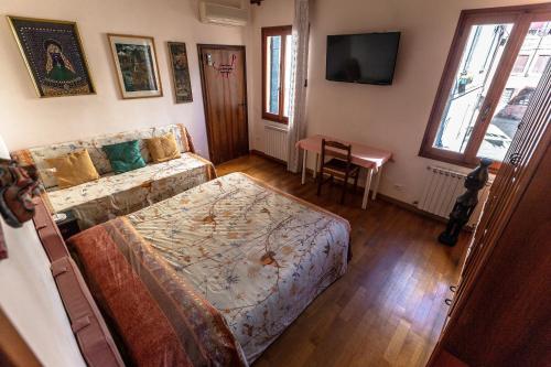 Postel nebo postele na pokoji v ubytování Ciprea Rooms