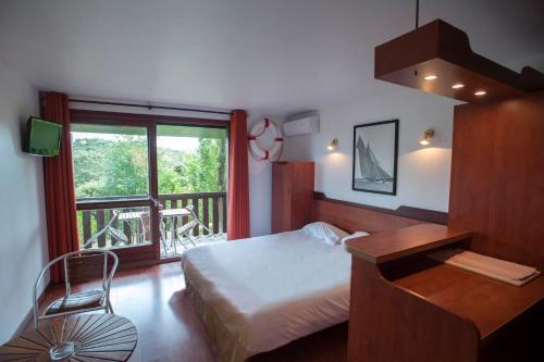 Postel nebo postele na pokoji v ubytování Residence Castell'Verde
