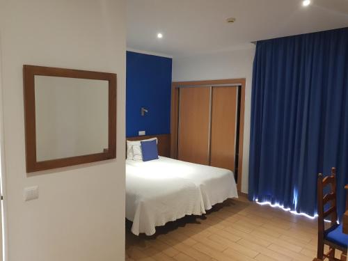 Una cama o camas en una habitación de Frentomar