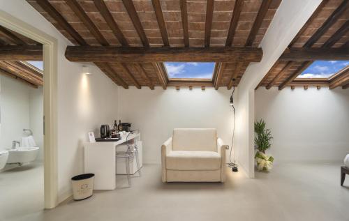 Palazzo Cini Luxury Rooms in Pisaにあるシーティングエリア