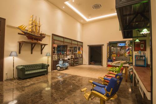 Гостиная зона в Riviera Suites Melaka