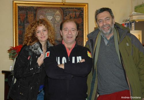 two men and a woman posing for a picture at Hotel Relais Modica in Modica