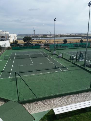 an overhead view of a tennis court at Casa Picadeiro in Figueira da Foz