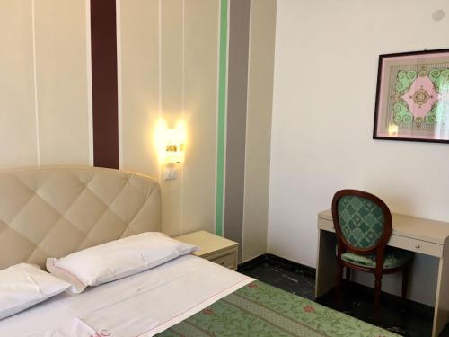 Postel nebo postele na pokoji v ubytování Park Hotel Castello