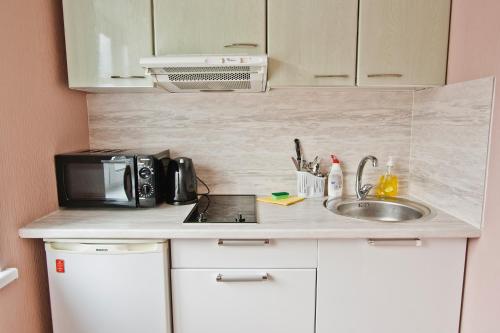 Kuchyň nebo kuchyňský kout v ubytování Gonsiori Apartment