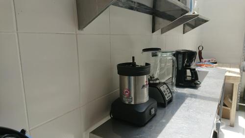 a blender sitting on a counter in a kitchen at Villa Mimi in Otavalo