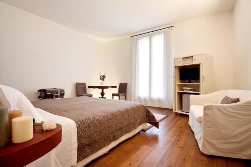 Postel nebo postele na pokoji v ubytování Hotel Due Mori