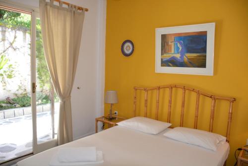 Posteľ alebo postele v izbe v ubytovaní Acrogiali Sunshine