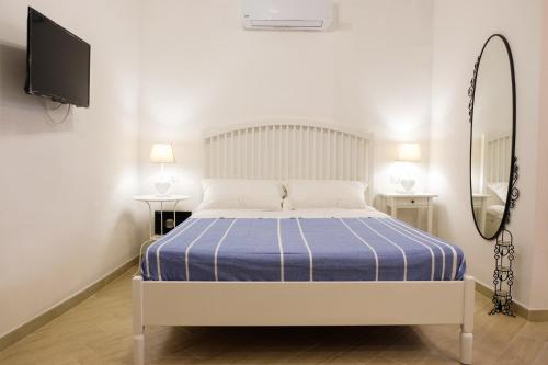 Кровать или кровати в номере O' Vascio Chic