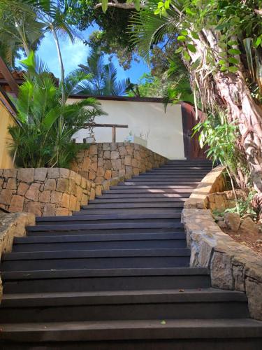 a set of stairs leading up to a building at Pousada Encanto de Búzios in Búzios