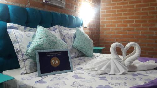 Katil atau katil-katil dalam bilik di Toca Hospedaria - Centro