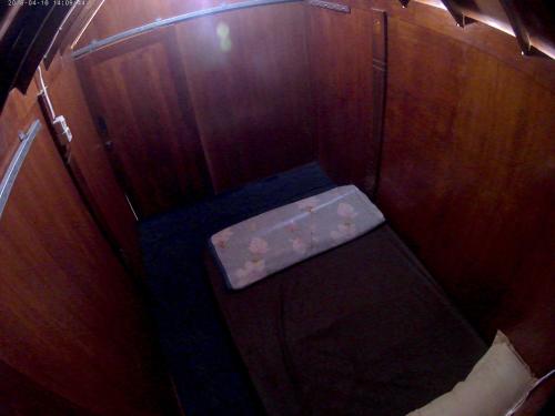 an overhead view of a small toilet in a room at Bale Sembahulun Cottages & Tend in Sembalun Lawang