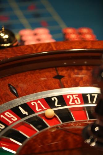 a close up of a casino roulette wheel with a ball at The Melanesian Port Vila in Port Vila