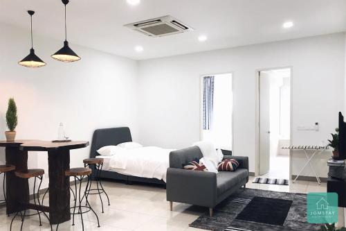 Posezení v ubytování JOMSTAY Octagon Ipoh Suites