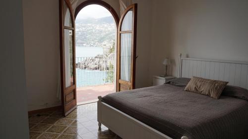 Säng eller sängar i ett rum på Villa Malù Amalfi Coast