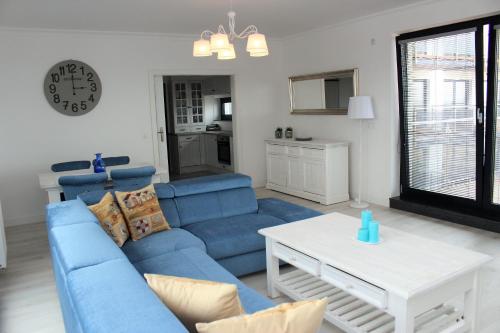 Кухня или мини-кухня в Apartamenty Przy Latarni Kropla Bałtyku
