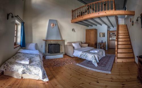 Un pat sau paturi într-o cameră la Althea Guesthouse