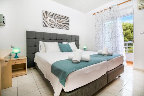 Postel nebo postele na pokoji v ubytování Platoni Elite Villas