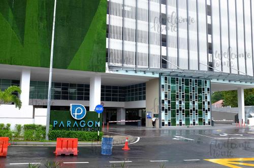 a parking lot in front of a large building at Paragon Suites CIQ Homestay by WELCOME HOME in Johor Bahru