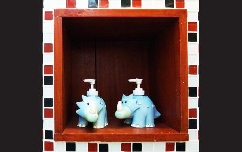 two blue vases sitting in a wooden box at Phuket Paradiso in Chalong 