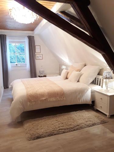 Ένα ή περισσότερα κρεβάτια σε δωμάτιο στο Ferienhaus Rosenhof