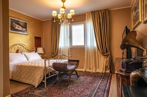 Posteľ alebo postele v izbe v ubytovaní Villa Luisa Rooms and Breakfast