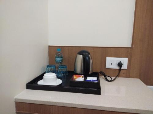 Příslušenství pro přípravu čaje a kávy v ubytování Hotel iStay