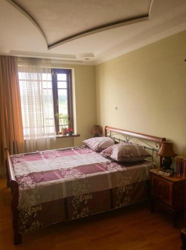 Llit o llits en una habitació de Chekin Imereti
