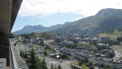 a view of a city with mountains in the background at Monterotta 18 in Sestriere