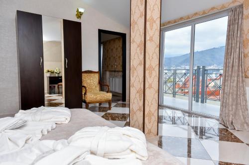 Postel nebo postele na pokoji v ubytování MariaLuis Hotel