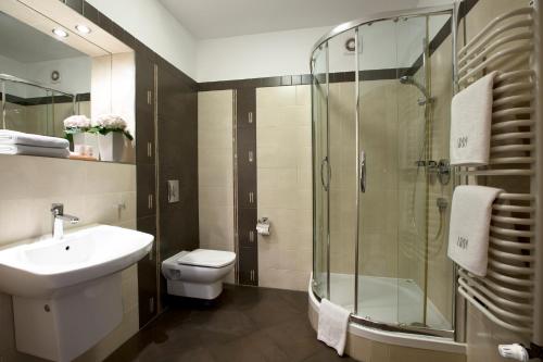 Ванная комната в Benefis Boutique Hotel