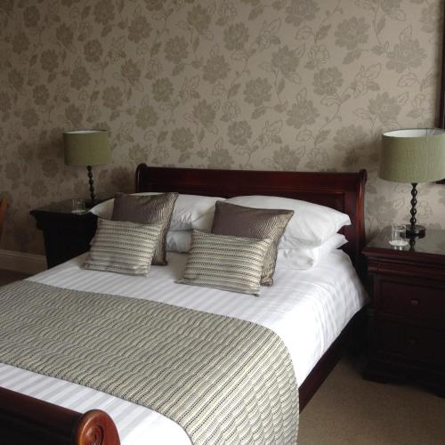 Katil atau katil-katil dalam bilik di Endeavour Guest House