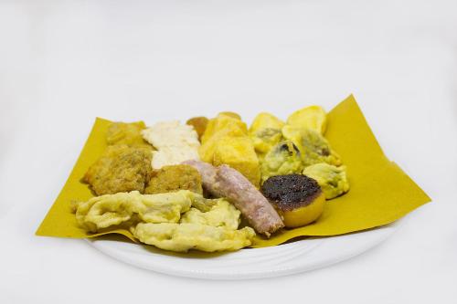 a plate of breakfast food on a white plate at Ristorante Buasca in Cuorgnè