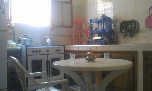 Una cocina o cocineta en Dar Aicha