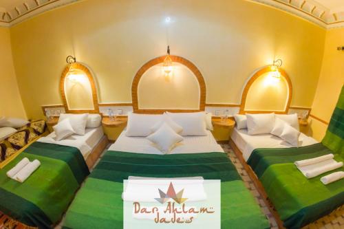 Una cama o camas en una habitación de Dar Ahlam Dades Hotel