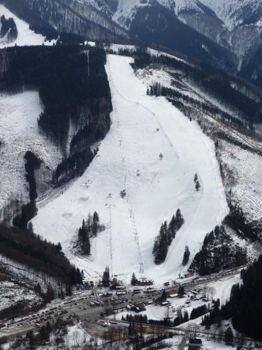 an aerial view of a ski slope in the snow at Drevenica u Maťa, Terchová in Terchová