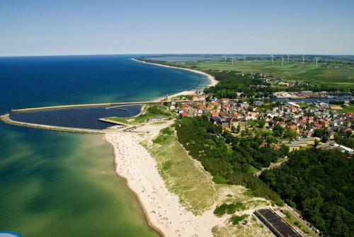 an aerial view of a beach and the ocean at Hotel Lidia Spa & Wellness in Darłówko