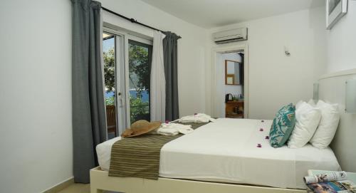 Mekvin Hotels Deniz Feneri Lighthouseにあるベッド