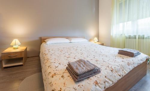 Ένα ή περισσότερα κρεβάτια σε δωμάτιο στο Apartment Dean