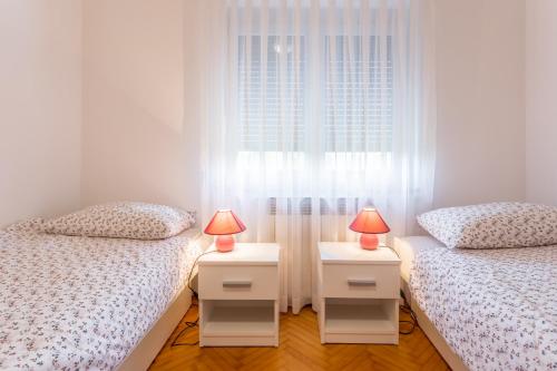 Ένα ή περισσότερα κρεβάτια σε δωμάτιο στο Apartment Dean