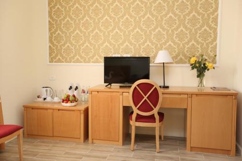 TV a/nebo společenská místnost v ubytování Sergei Palace Hotel