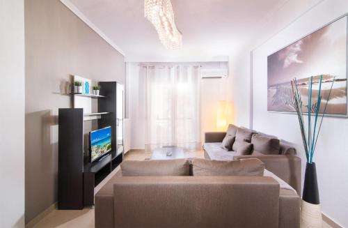 Michalis Apartmentsにあるテレビまたはエンターテインメントセンター
