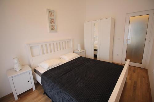 Posteľ alebo postele v izbe v ubytovaní Lux Haus