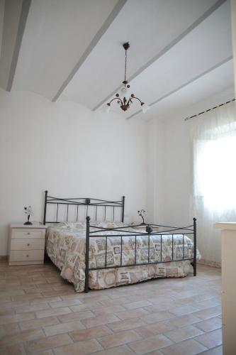A bed or beds in a room at Villa Elvira