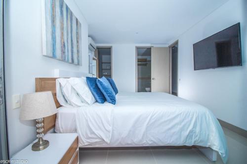 Posteľ alebo postele v izbe v ubytovaní Magnífico apto de 1 habitación con vista inmejorable al mar en Bocagrande