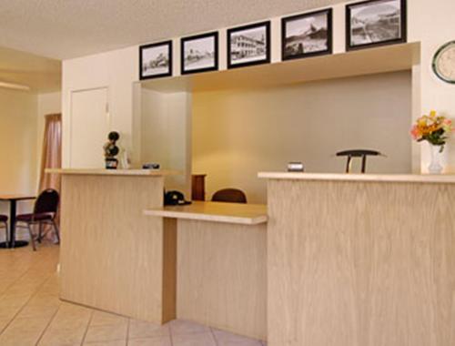 a lobby with a reception desk in a hospital at Super 8 by Wyndham Red Bluff in Red Bluff